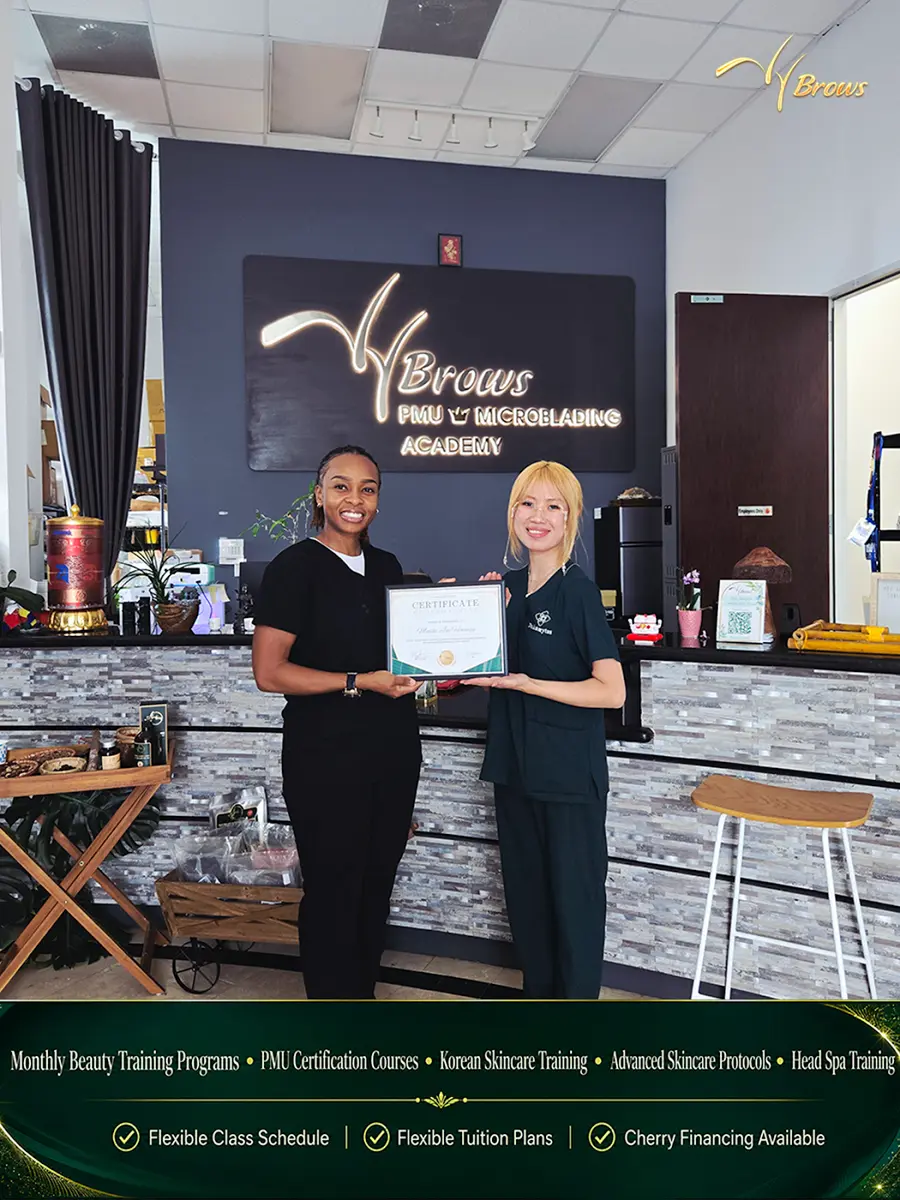 VyBrows graduate receiving her certificate